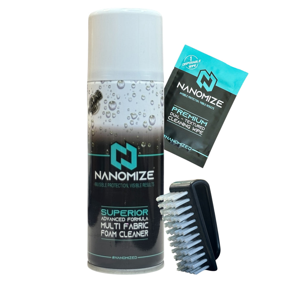 The Nanomize Superior Advanced Formula Multi Fabric Foam Cleaner Kit, including the spray can, premium disposable cleaning wipe, and black scrubbing brush
